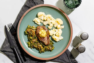 Buttery Steak over Creamy Spinach and Cauliflower